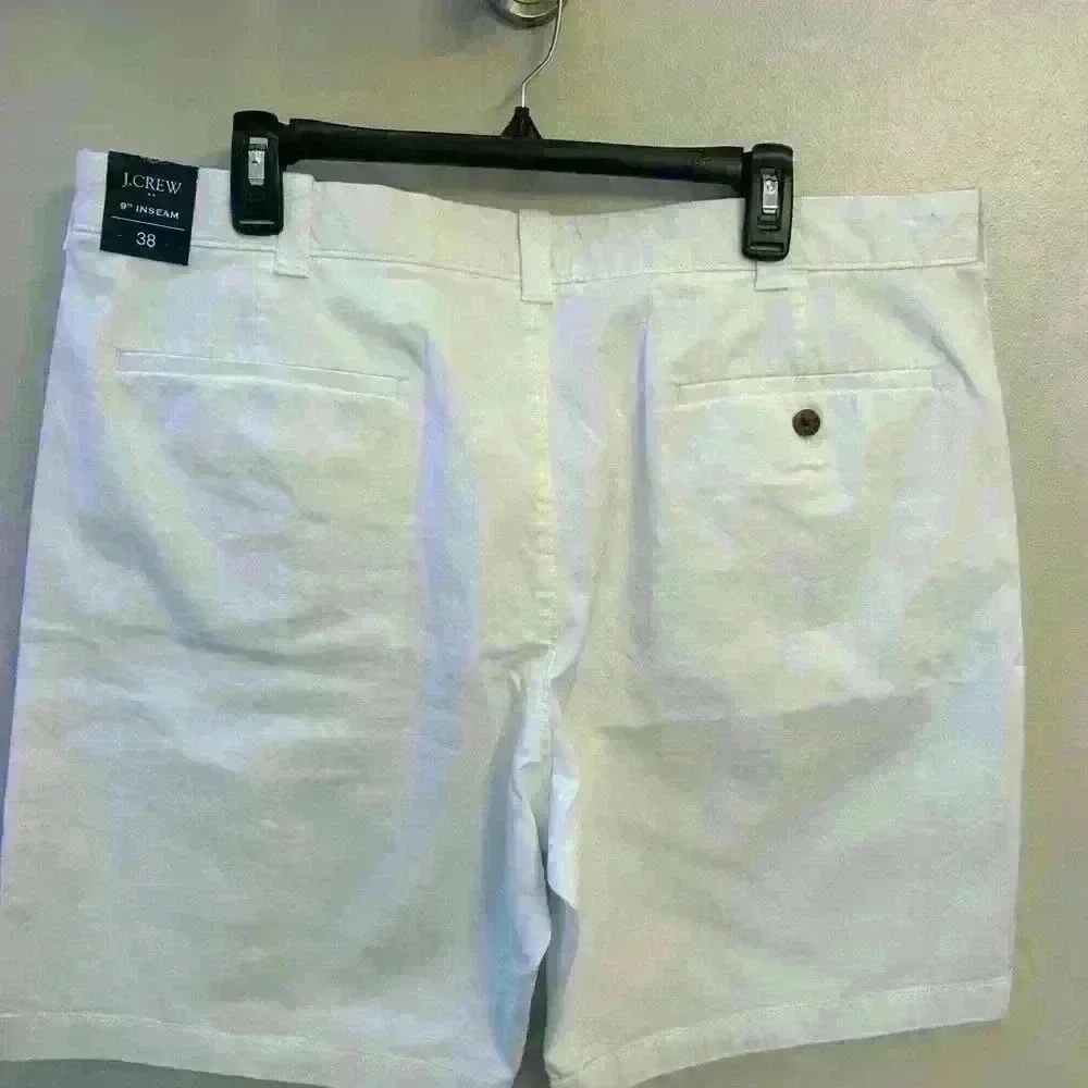 Men's JCrew white flat front shorts.  Size 38 with a 9inch inseam. NWT